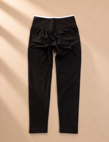 Leggings tobillero high rise Comfortlux negras con líneas blancas